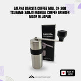 Lalpa Barista Coffee Mill CK-300 manual coffee grinder with a stainless steel body, black handle, and black band, shown next to its black retail box. The image includes text overlays reading 'LALPHA BARISTA COFFEE MILL CK-300 TSUBAME-SANJO MANUAL COFFEE GRINDER MADE IN JAPAN' and a 'MADE IN JAPAN' badge.