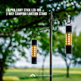 A 2-way camping lantern stand by LALPHA LIGHT STICK LED-105, featuring two hanging cylindrical LED light sticks with black and silver metal components, set against a blurred green outdoor background. White text at the top left reads 'LALPHA LIGHT STICK LED-105 2-WAY CAMPING LANTERN STAND', and a 'GO CAMPTHING SHOP' logo is visible at the bottom.