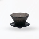 Black coffee dripper on a white background